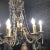 French Early 20th Century 8 Light Crystal & Bronze Chandelier For Sale - Image 3 of 8