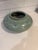 Vintage Asian celadon vase featuring a crackle glaze and a motif of cranes in flight. This is a perfect addition to any...