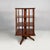 English mid-century modern revolving wooden bookcase, 1940s Revolving bookcase made entirely of wood. It features three...