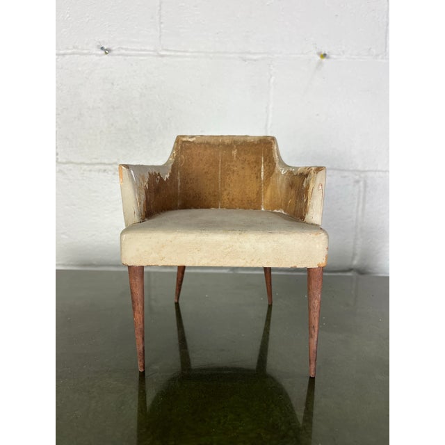 An intriguing vintage sculptural representation of a Mid-Century Modern lounge chair. Handcrafted with expressive...