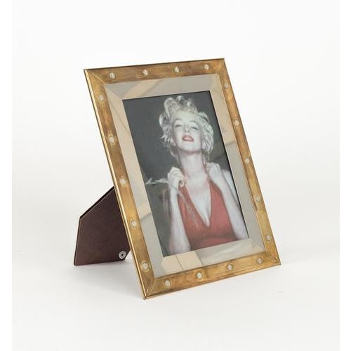 Midcentury beautiful picture photo frame in brass, steel and glass with screws by Noel B.C. Made in Italy in the 1970s....