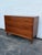 This magnificent Small Dresser is made of wood, walnut, and veneer. The dresser was made by Ramseur Furniture and it is...