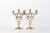 Vintage matching pair of brass three-arm candelabras with pierced filigree bodies featuring peacock and scrolling...