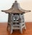 Vintage cast iron Japanese pagoda lantern with slight rust patina and a small door designed to hold a candle. Measure 10"...