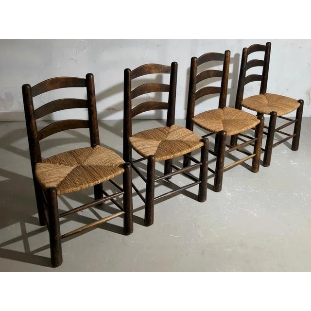 A suite of 4 massive chairs, modernist, brutalist, popular art, impressive solid wood structures with thick legs, mulch...