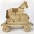 Circa 1920s/30s folky homemade wood horse pull toy with leather bridle and saddle, horse hair tail. Horse has crackled...