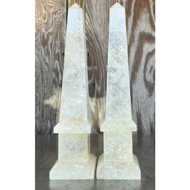 Stunning pair of vintage boho rock crystal obelisks, radiating natural elegance. Each piece is beautifully carved,...