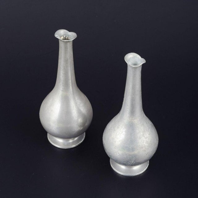 Just Andersen. Two pewter vases, model 1457. Denmark, 1940s. Slim vases in cast pewter with circular foot, drop-shaped...