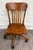 This is an absolutely gorgeous vintage, possibly antique, tiger oak adjustable swivel desk banker, lawyer, jury chair or...
