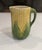 A magnificent, instantly curated trio of late 19th-century Victorian English majolica pitchers, celebrating the era's...