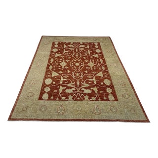 Middle Eastern Wool Rug in Light Red with Gold-Colored Accents For Sale