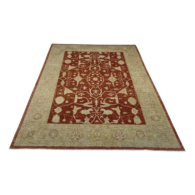Middle Eastern Wool Rug in Light Red with Gold-Colored Accents For Sale