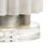 Our modern interpretation of industrial gears, langdon lamp features a cast of natural white faux stone on a crystal...