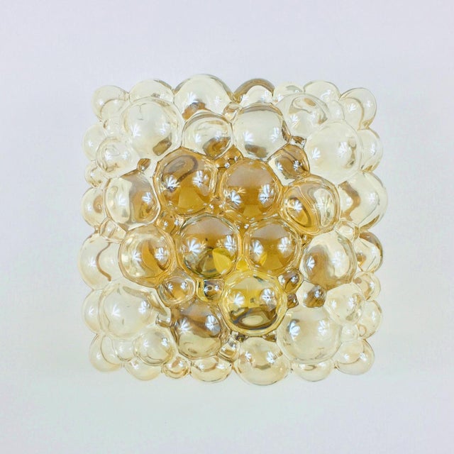 Beautiful bubble glass wall light/sconce by helena tynell for limburg, germany, 1970s. The light amber/champagne hand...