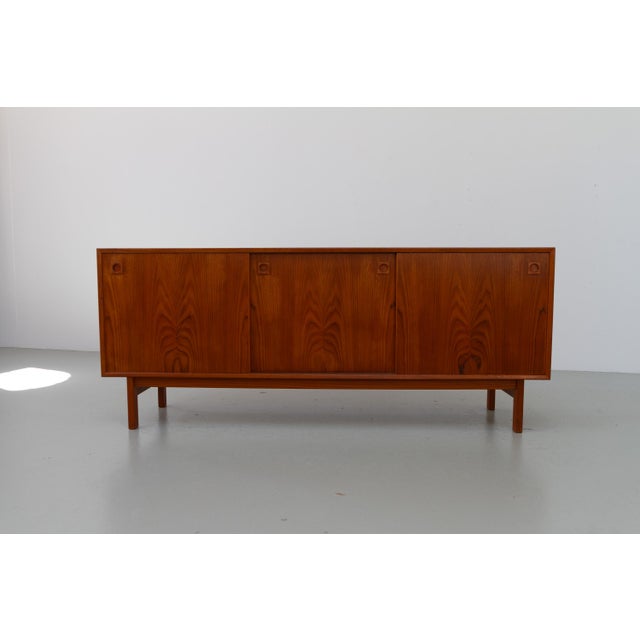 Danish Mid-Century Teak Sideboard by Skovby, 1960s. Very classic and iconic type of low credenza of the Scandinavian Mid-...
