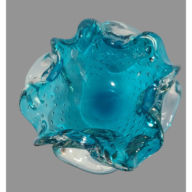 Capture the elegance of Venetian craftsmanship with this Vintage Italian Attributed, Murano Art Glass Candy Dish Bowl. The...