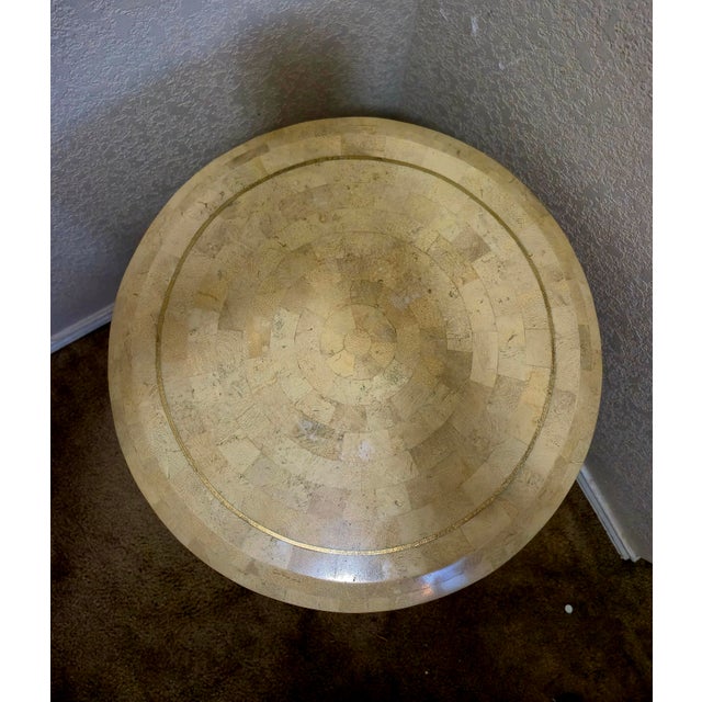 A striking modernist, drum-form side table by renown manufacturer Maitland-Smith, expertly crafted in the Philippines...