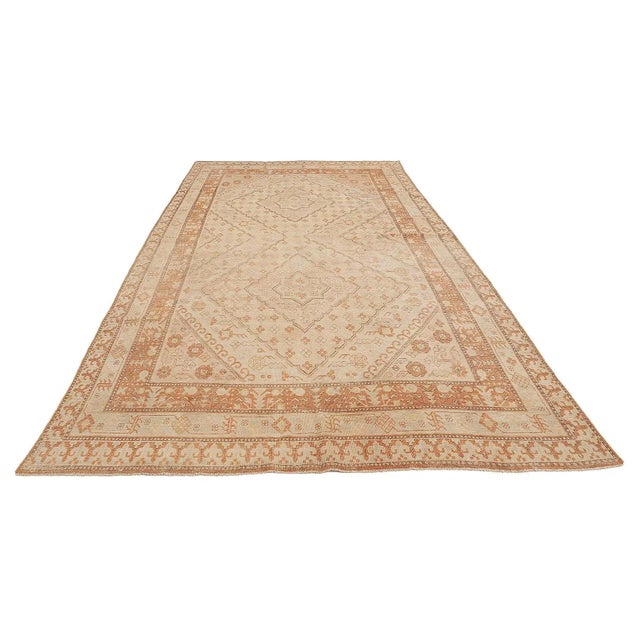 Antique handknotted decorative wool Khotan rug. Approximatelly 70-80 years old. In very good condition.