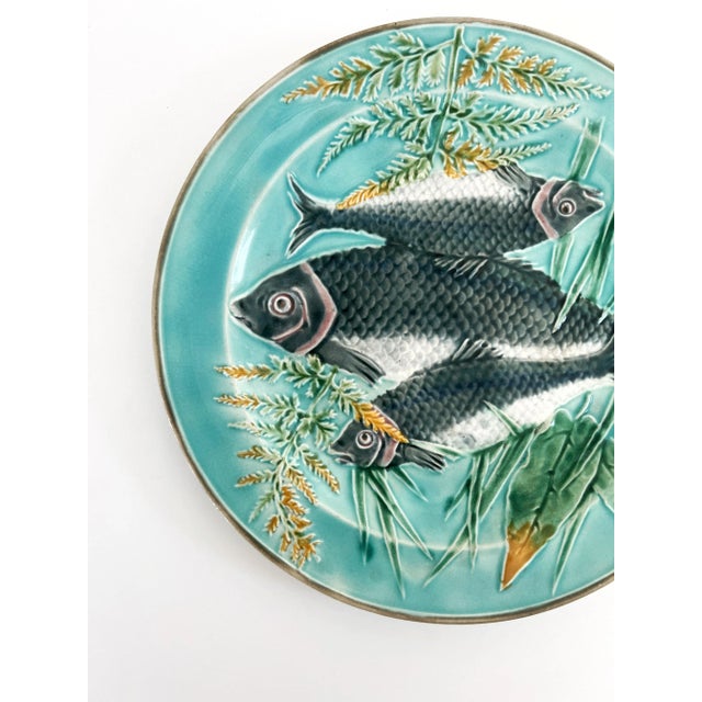 An Antique 19th Century English Wedgwood Majolica Fish Seaweed Plate, Circa 1880. On the reverse side there is the maker's...