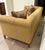 Chesterfield-style sofa with a contemporary update, suitable for modern decor preferences. It features classic deep...