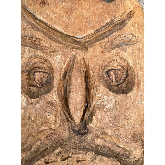 Deeply carved heavy wood hanging sculptural plaque Burn in signature on the back approximately 23.5 high 16 wide 2 inches...
