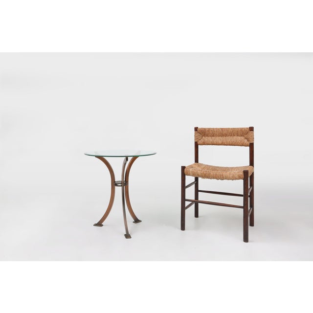 Elegant and stylish Belgo Chrom side table with round glass top and sleek metal base. Made in Belgium around 1980. Crafted...