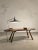 An adjustable, modernist, Bauhaus, constructivist, libre-shaped table lamp, a circular-shaped circular base in brown wood,...