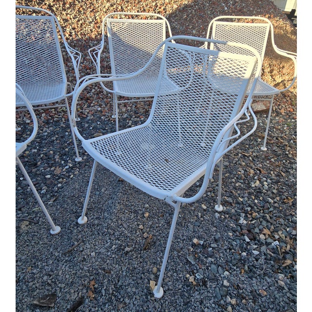 Add some Mid-Century charm to your patio with this vintage seven-piece wrought iron lounge set from Woodard. The set...