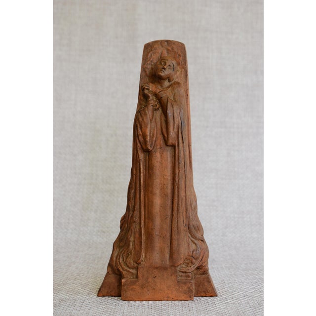 A rare French sculpture depicting Joan of Arc, created in the 1930s by renowned sculptor Maxime Real Del Sarte...