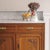 This two-door oak washstand with a marble top and upper section dates from the Art Nouveau period, circa 1900–1910. The...