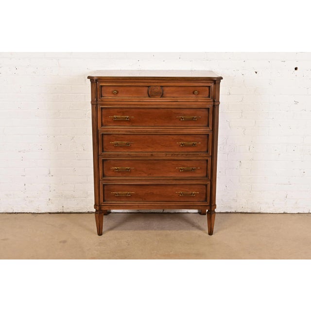 A gorgeous mid-century French Regency Louis XVI style highboy dresser or chest of drawers By Kent Coffey USA, 1960s...