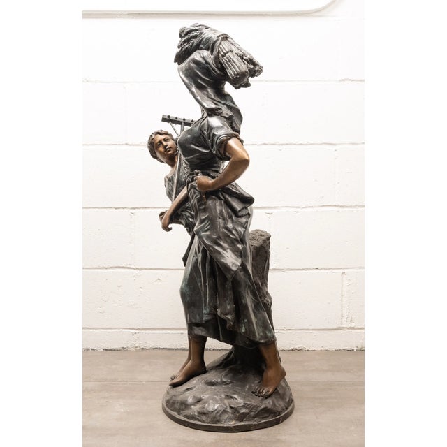 Large Antique French Bronze Sculpture “Return From The Harvest” Attributed to Mathurin Moreau This monumental antique...