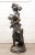 Large Antique French Bronze Sculpture “Return From The Harvest” Attributed to Mathurin Moreau This monumental antique...