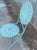 An exceptional, highly collectible mid-century modern three-piece metal outdoor bistro suite, confidently attributed to...