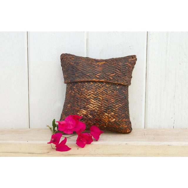 A charming rattan pouch. This charming basket made in the mountains of Nepal was part of everyday life for each family and...