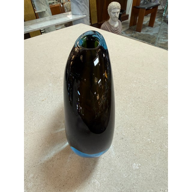 The “Valva” vase designed by Flavio Poli for Seguso is a refined example of Murano glass artistry, distinguished by its...