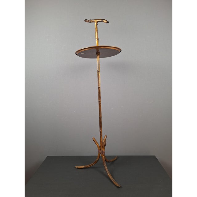Hollywood Regency side table in faux bamboo with a beautiful rose gold patina, copper plates, 1970s, in the style of...