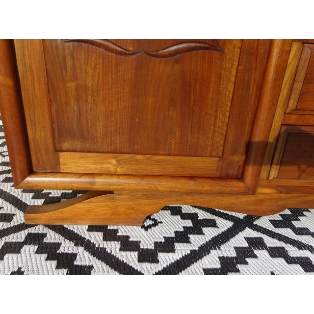 A beautiful art deco sideboard crafted entirely from solid walnut. Its clean, simple lines make it suitable for any décor....