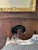 Antique Chippendale Style Mirror with Gold Leaf carved center medallion and fillet. Overall size is 24.5 x 40.25. Beveled...