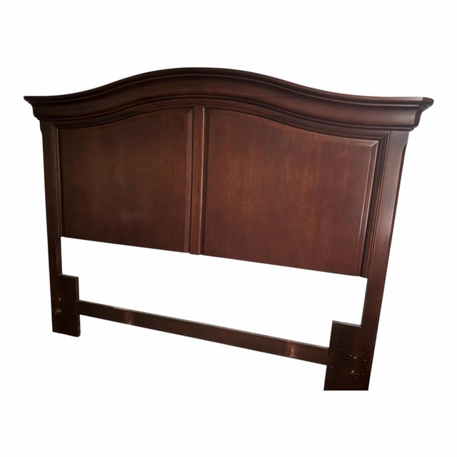 Elegant queen headboard from the Thomasville Impressions Martinique Collection, crafted in richly finished cherry wood...