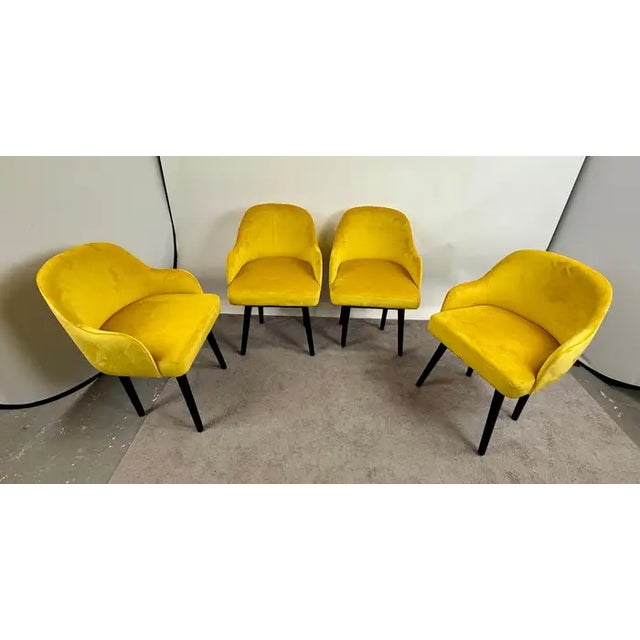This exquisite set of four Mid-Century Modern dining or side chairs exudes a refined elegance, seamlessly blending...