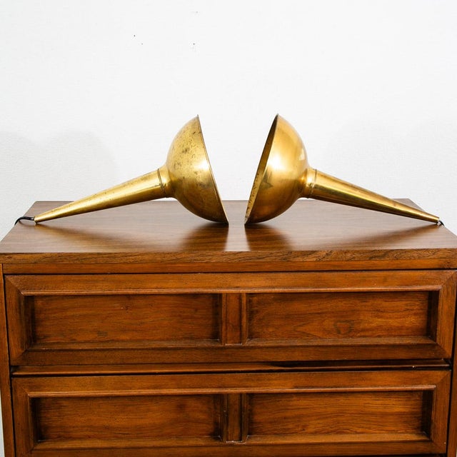 Unique and well constructed pendant ceiling lamp set in gold / brass. These lamps will be to be hardwired into a ceiling....