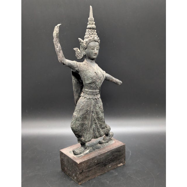 This excellent antique bronze figure is a representation of a traditional Thai dancer called an Apsara. These figures are...