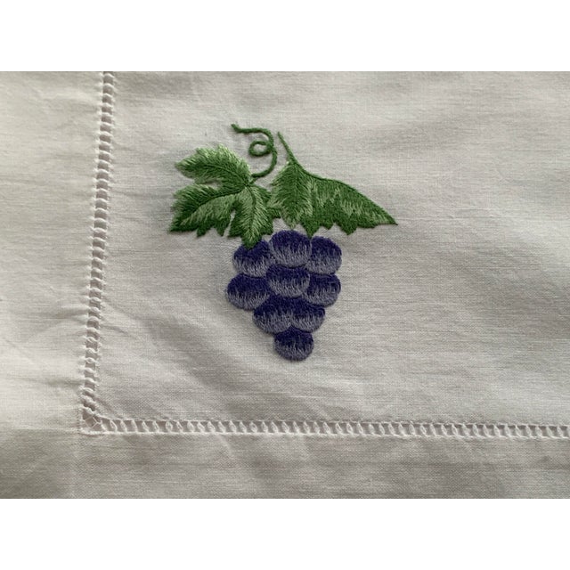 Set of 4 White Cotton Placemats With Embroidered Grapes from Williams Sonoma. Comes from a smoke and pet free home....