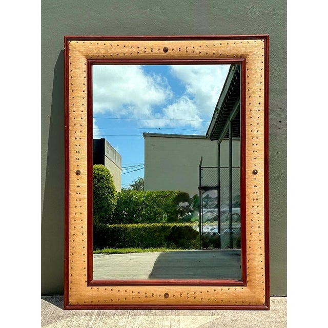Combining warm organic texture with mid-century architectural presence, this vintage floor mirror makes a commanding...