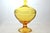 Tall vintage Mid-Century amber pebble glass pedestal bowl with a squared finial handle lid. No maker's mark.