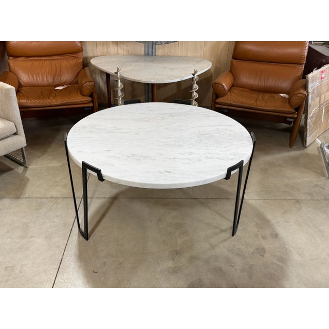 Coffee Table with White Marble Top France, 20th Century This coffee table seamlessly combines modern sophistication with...