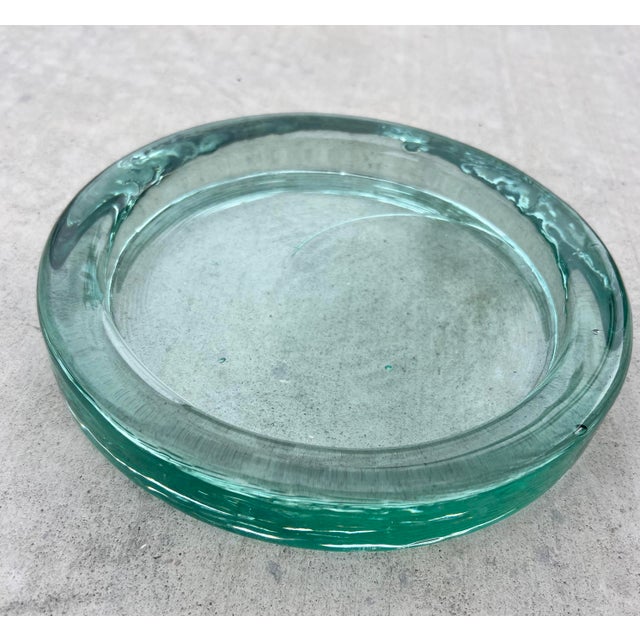 Substantial, artisan-crafted catchall dish. Expertly hand-blown from heavy, thick recycled glass. This piece features a...
