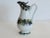 Circa 1880, English Victorian Floral Decorated Ironstone Syrup Jug. Beautifully hand decorated with three bands of...