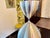 Large hourglass-shaped pendant light in brushed aluminum with dual lighting and an interior pull-chain switch. No dents,...